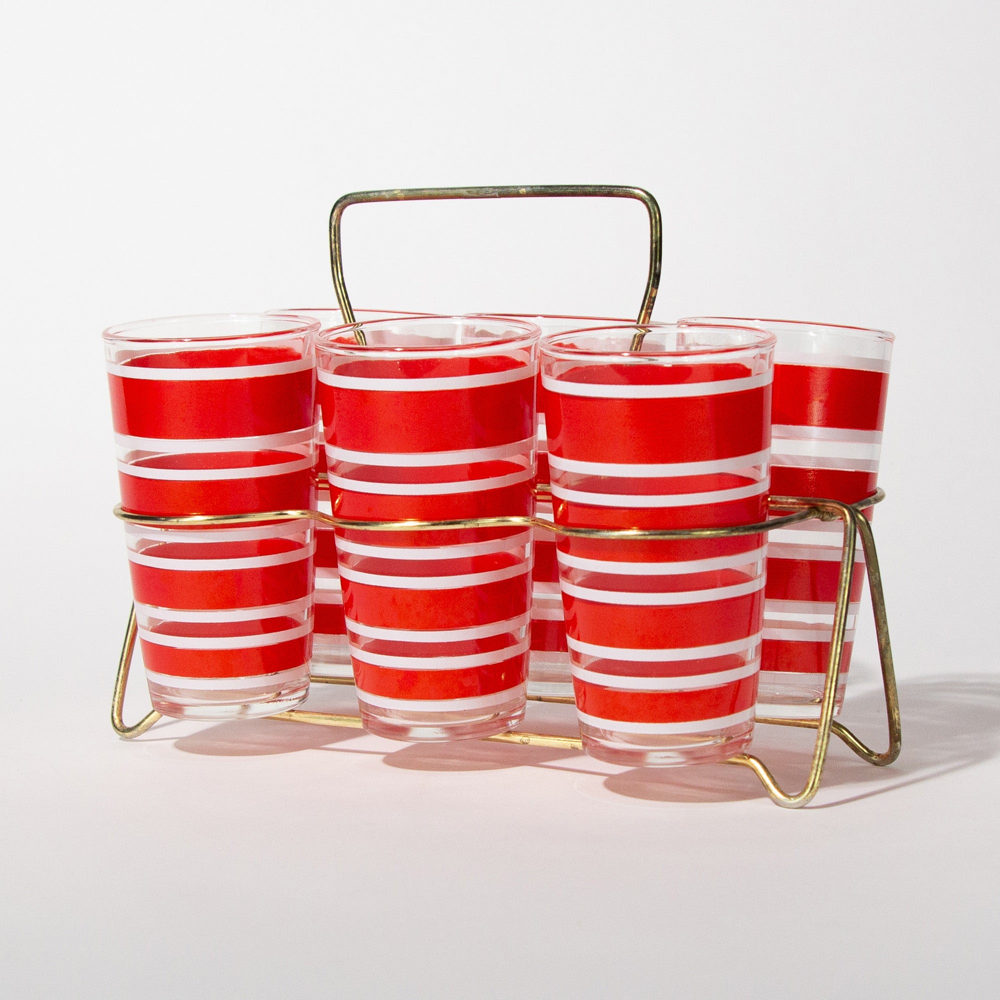 http://happyhourhome.co/cdn/shop/products/1_RedStripedGlassesCarrier_SQ.jpg?v=1682029235